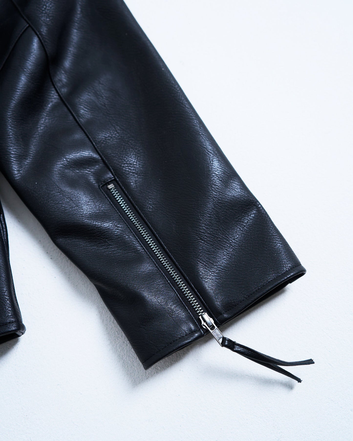 short length zipped PU-leather sport jacket