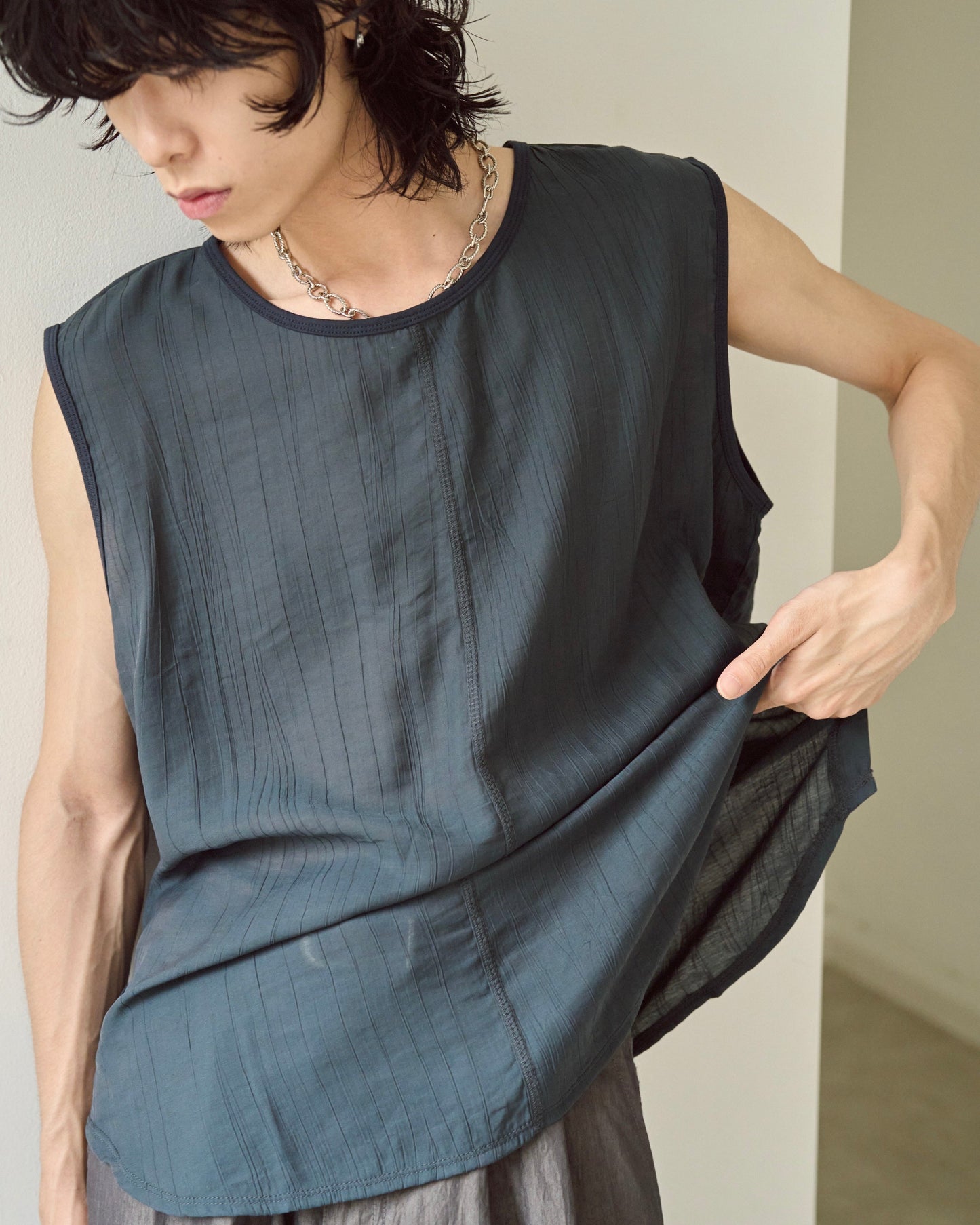 sleeve less semi-sheer tops