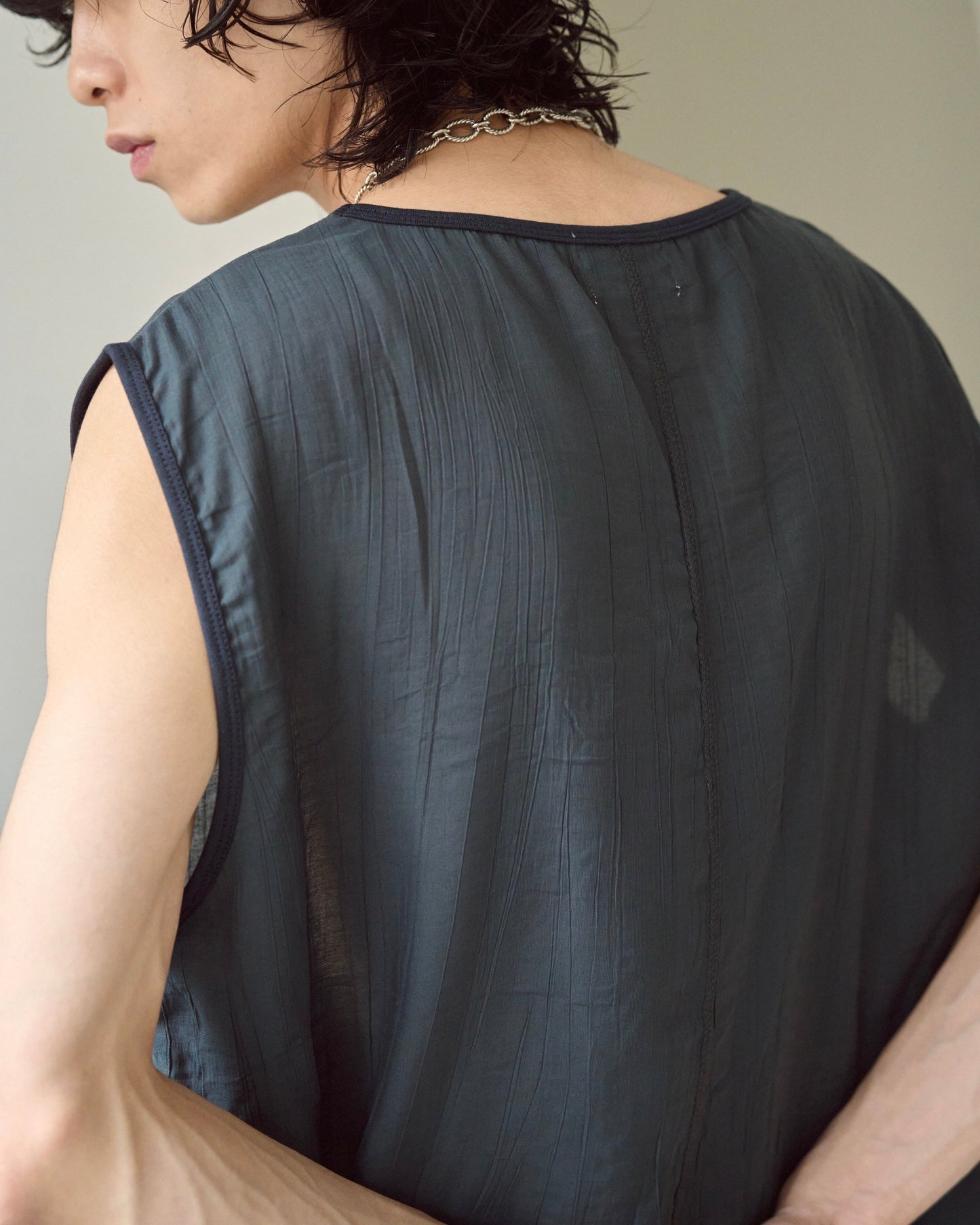 sleeve less semi-sheer tops