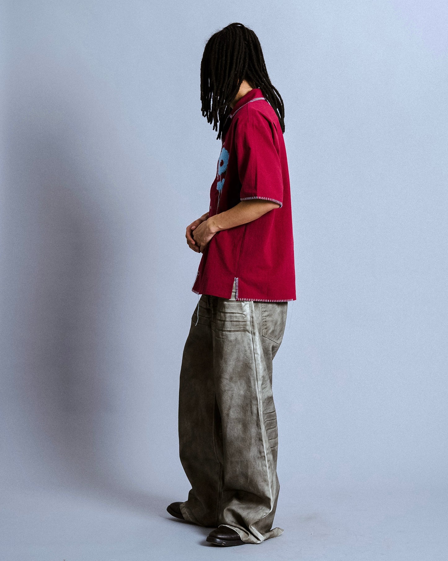 wide baggy spray processing denim trousers