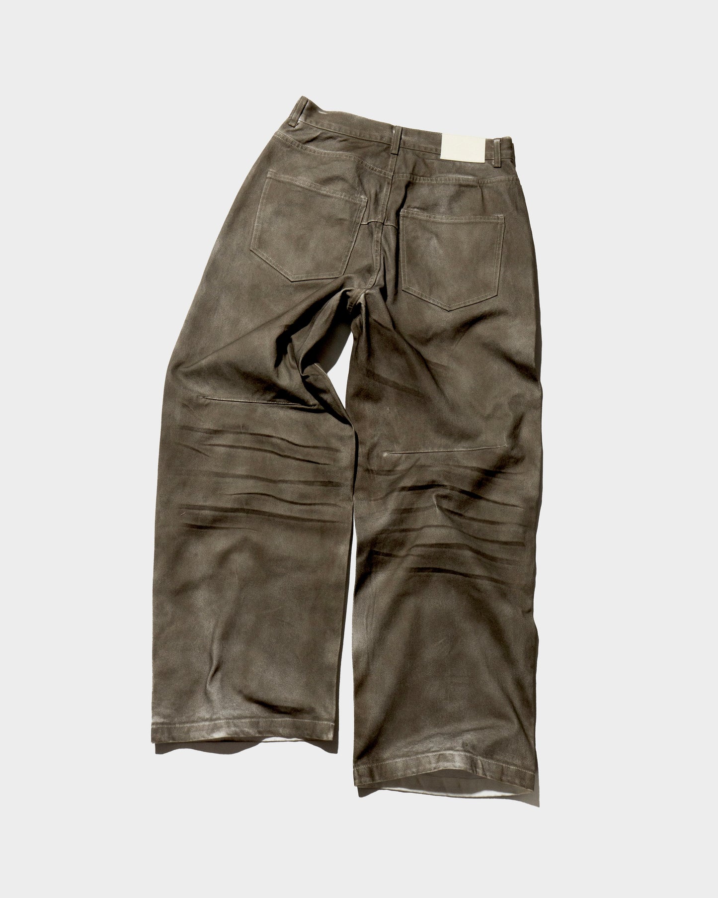 wide baggy spray processing denim trousers