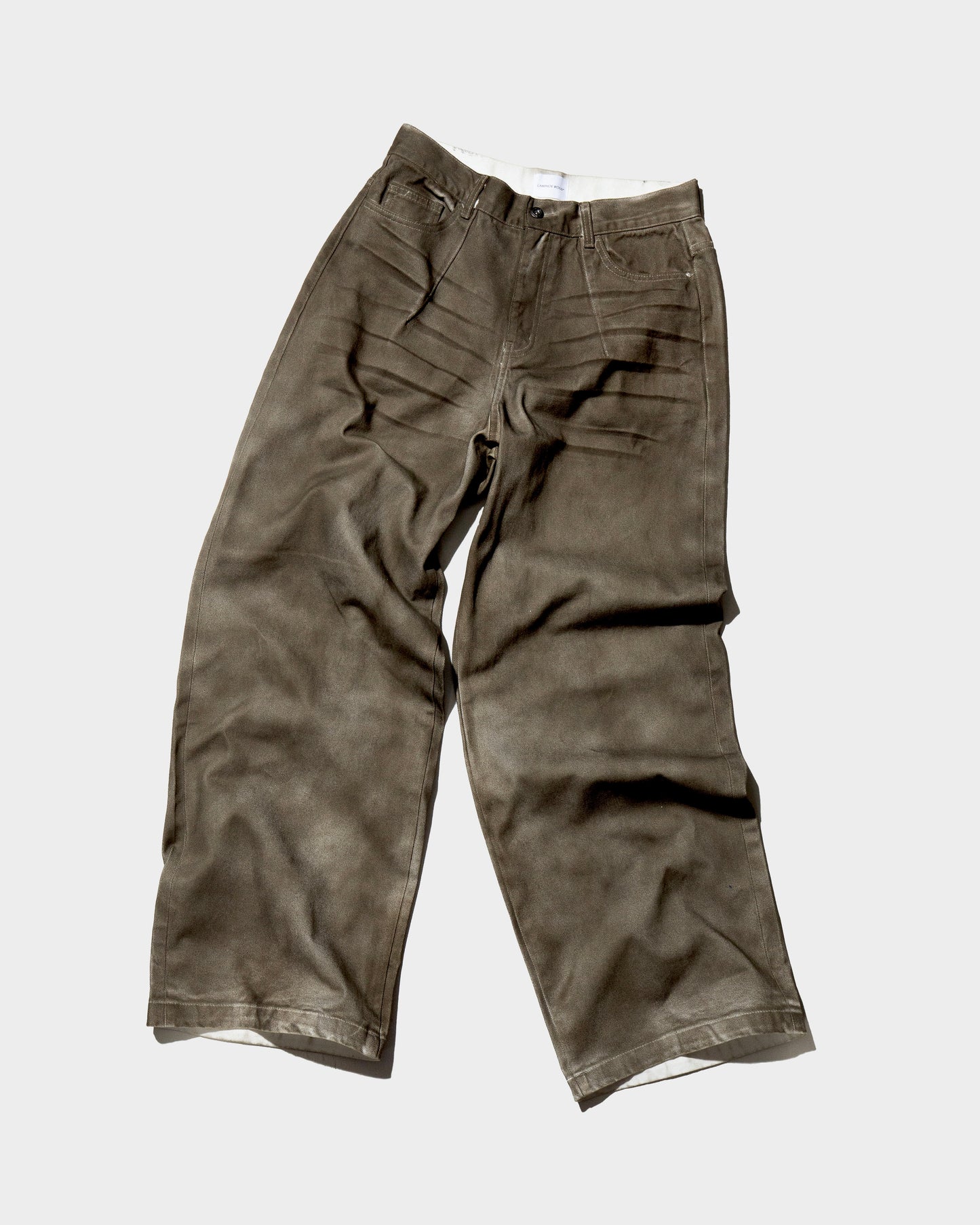 wide baggy spray processing denim trousers