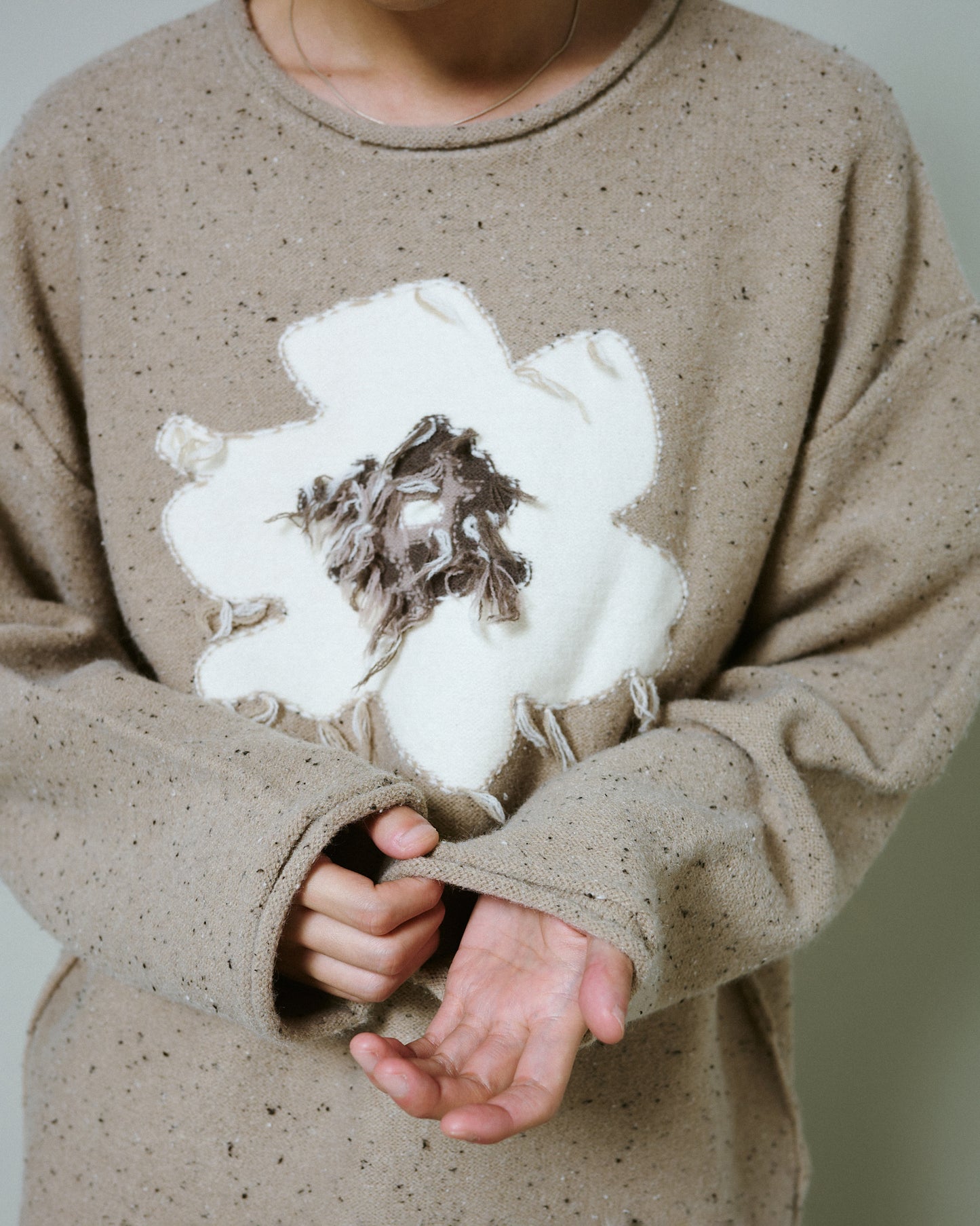 inside out flower motif nep sweater