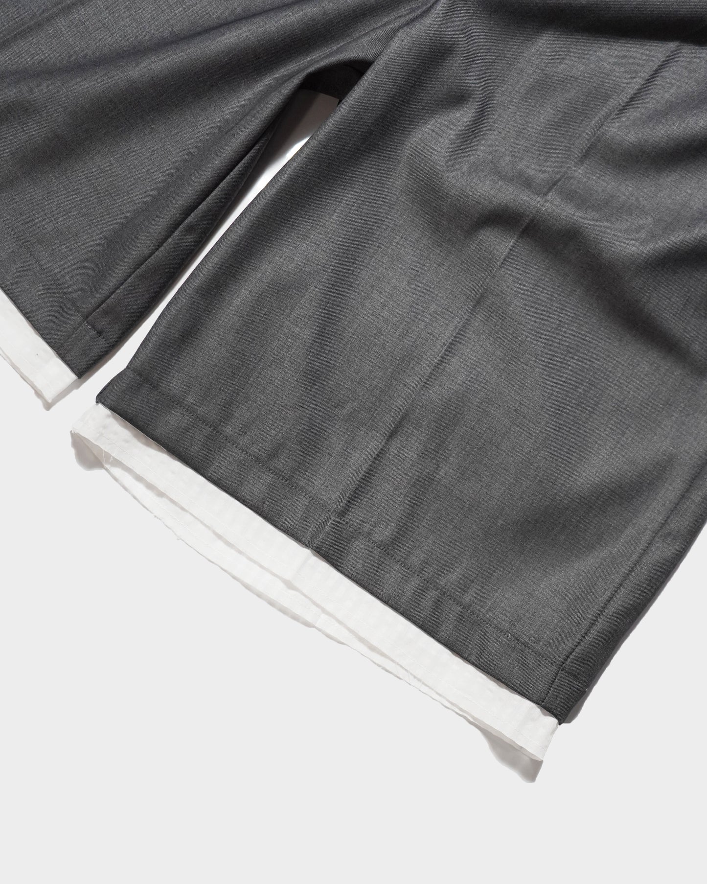 CUT OFF LAYERED SLACKS SHORTS